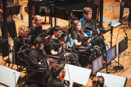 Four young people playing the Clarion.